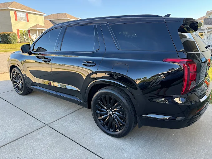 Custom vinyl wrap and vehicle trim detailing by Aces Detail